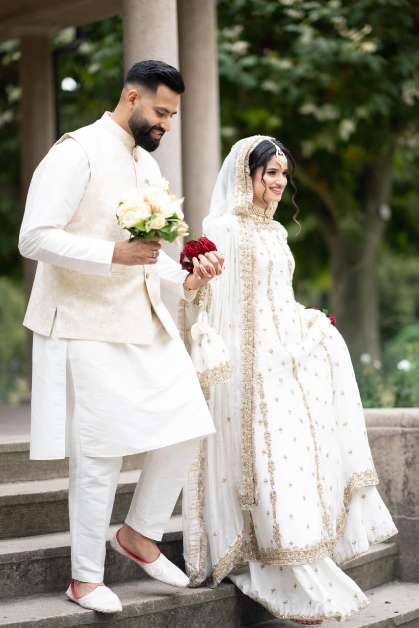Boutique ambiance with bridal ensemble on display, Lal Chuneriya Zari Collection